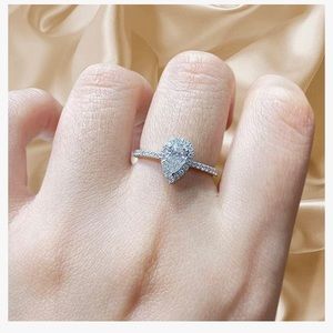 Sterling silver and 1.5 ct CZ halo ring.